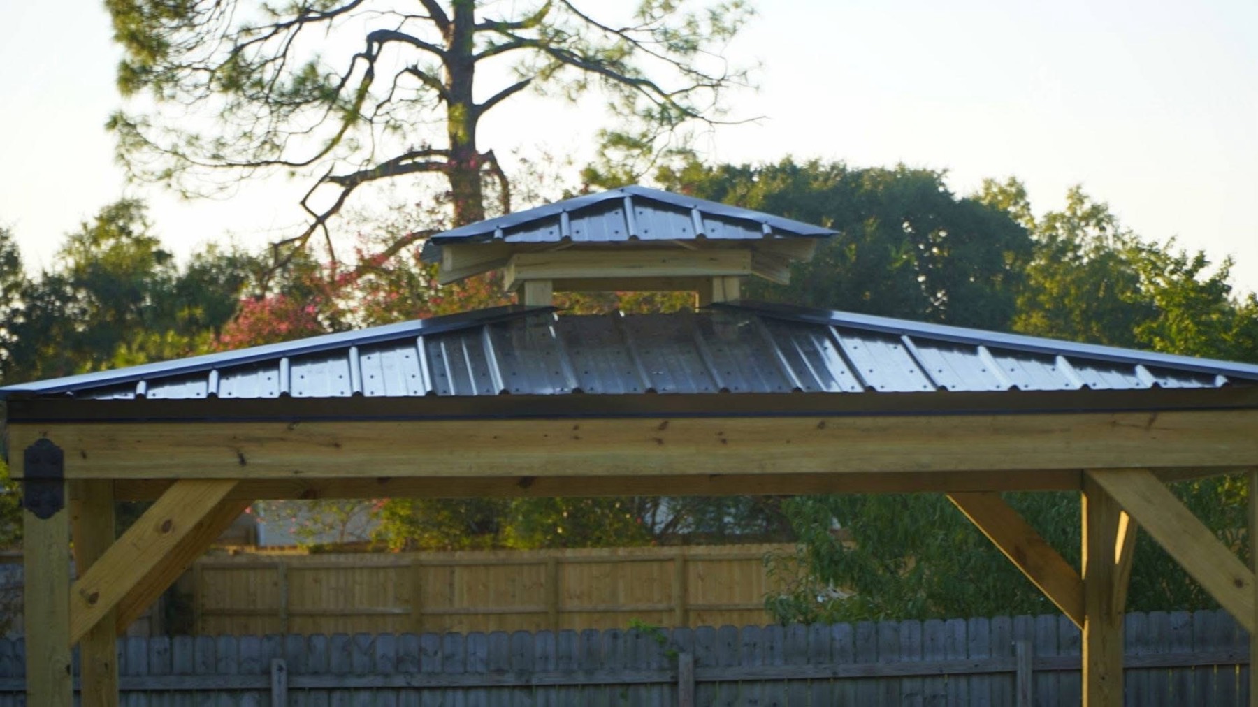 Double metal roof with cupola